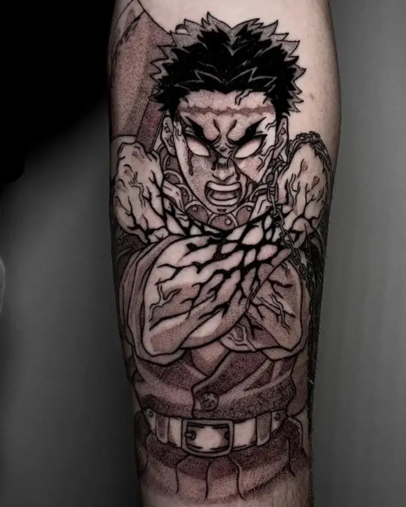 Tatuaje anime de Gyomei Himejima de Kimetsu no Yaiba en el antebrazo hecho por Carmen González en Yokai Tattoo Málaga