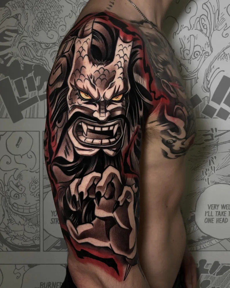 Tatuaje anime de Kaido de One Piece en hombro y brazo, por Alberto Pico en Yokai Tattoo Málaga