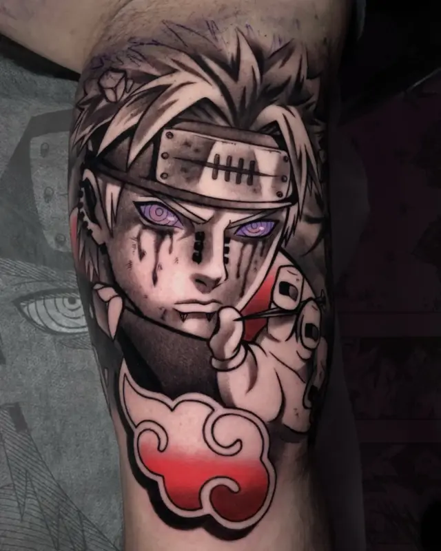 Tatuaje de Pain de Akatsuki con Rinnegan realizado en Yokai Tattoo Málaga